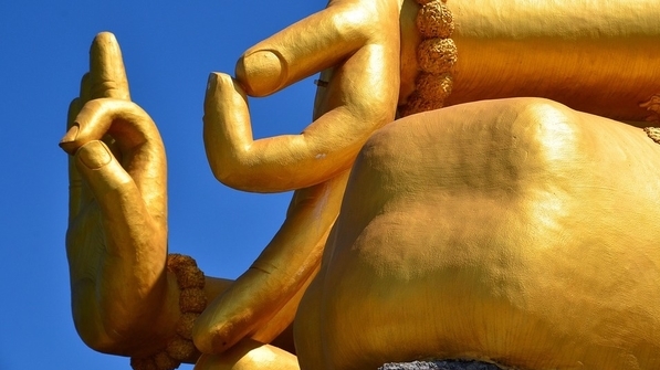hands of a statue in mudras
