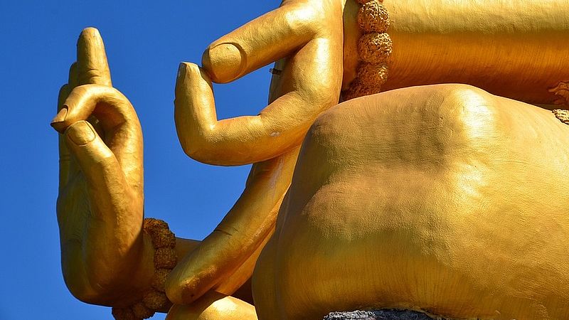 Hands of a giant statue showing mudras